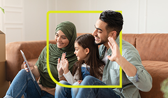 Family sitting together enjoying high speed connection